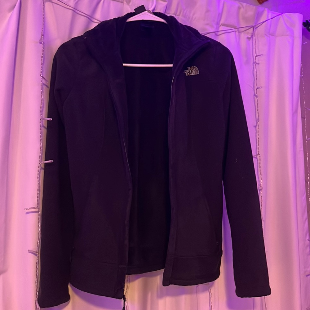 Black North Face zip up jacket with pockets